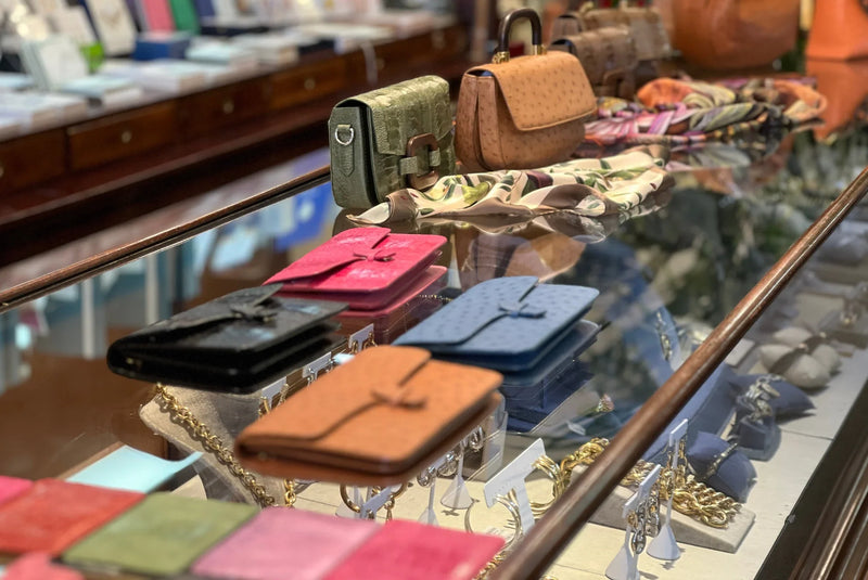 Cape Cobra leather handbags and accessories displayed inside Hartford House in St. Helena.